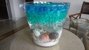 water bead vase with seashells